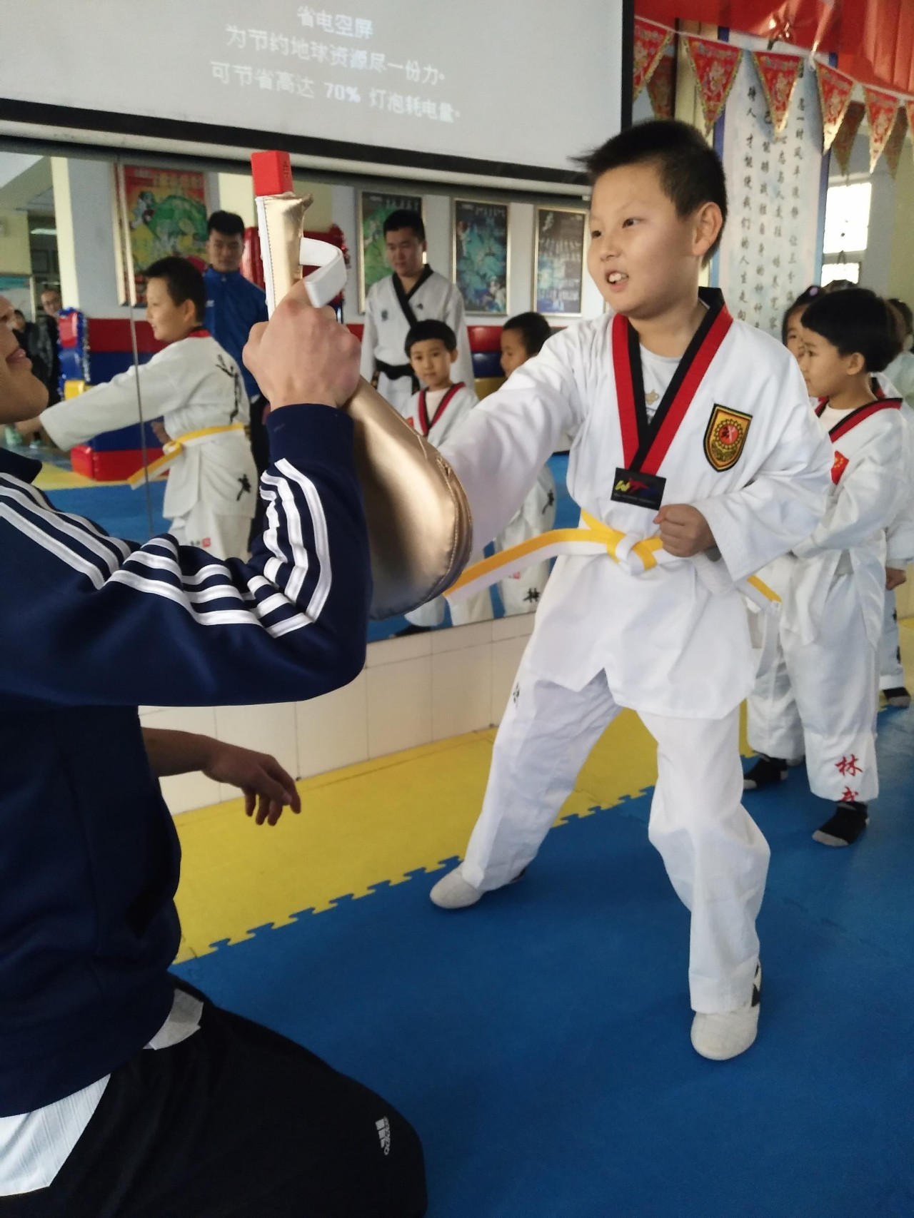 “抵抗寒冷和感冒打针说拜拜”-“全民健身大拜年”之林武跆拳道抗寒训练营活动(图3)